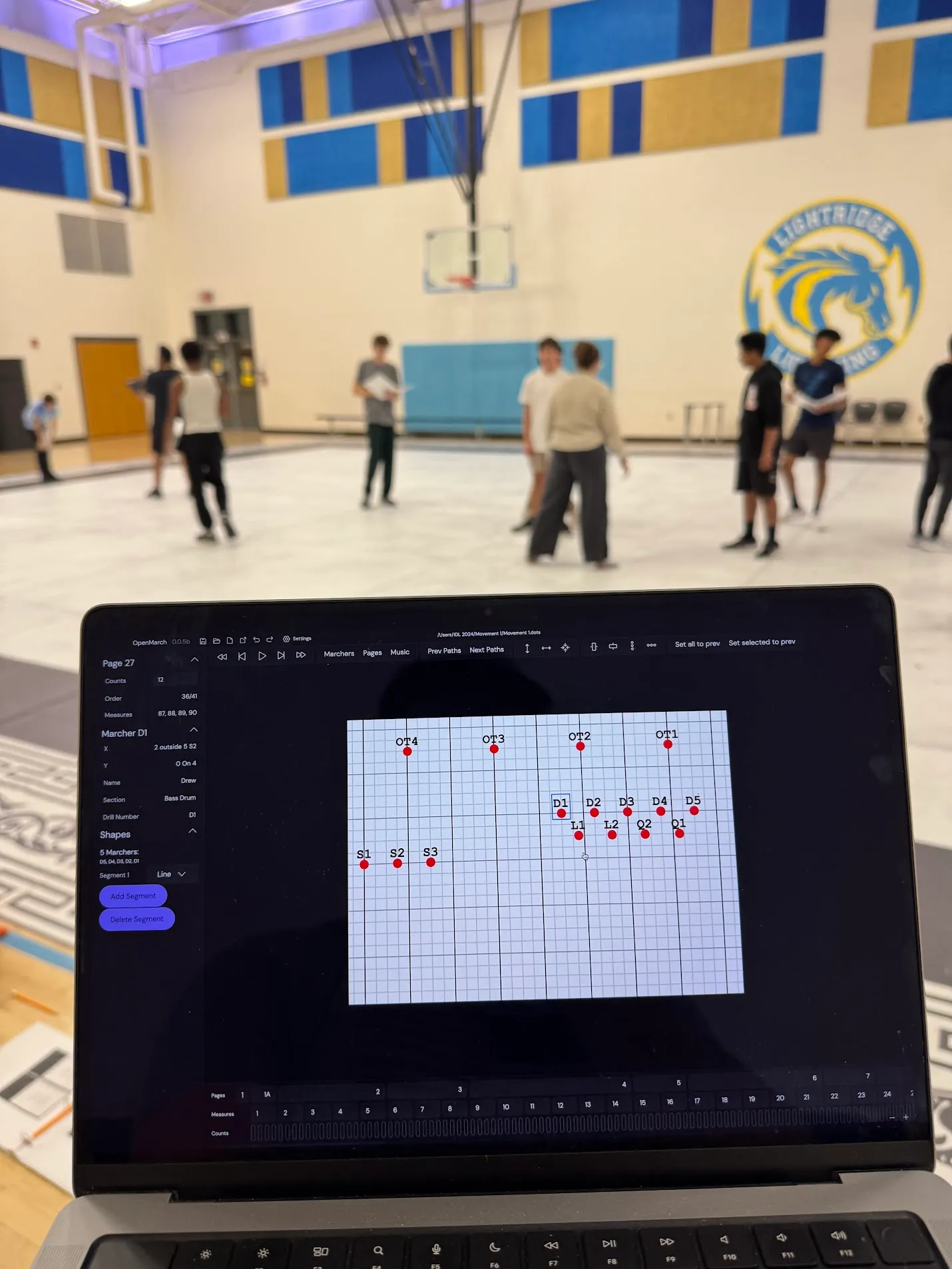 OpenMarch on my laptop in front of an indoor floor